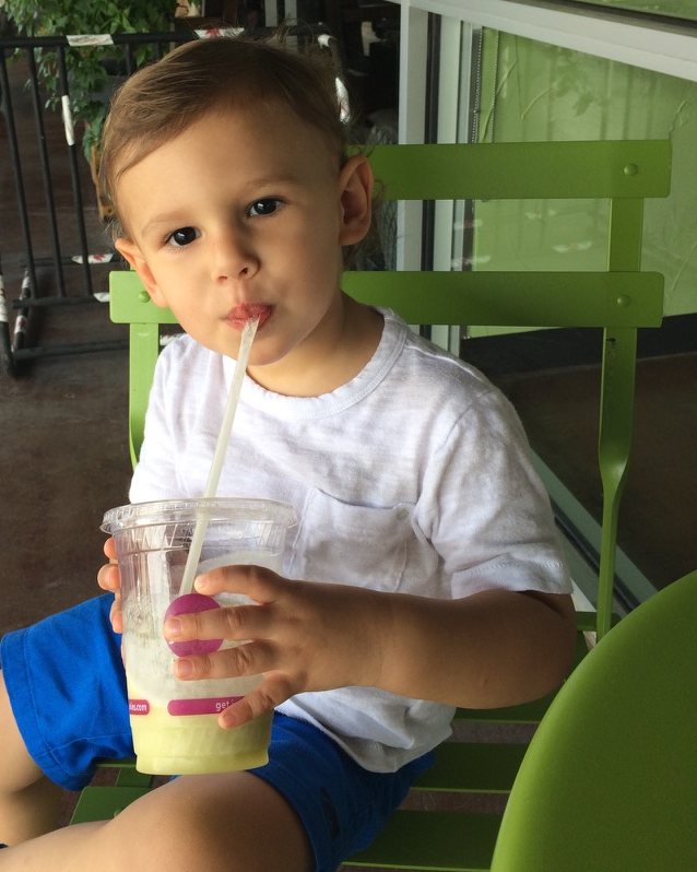 Ben's son Andrew, age 2, drinking a smoothie outside Juice Junkies in 2014
